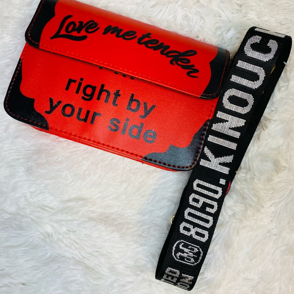“Love me tender” crossbody bag with guitar strap.
